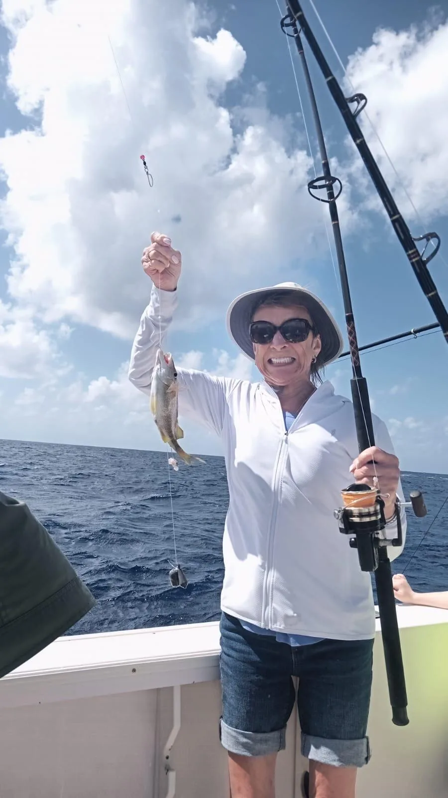 Bottom fishing at anchor with light tackle, Cozumel