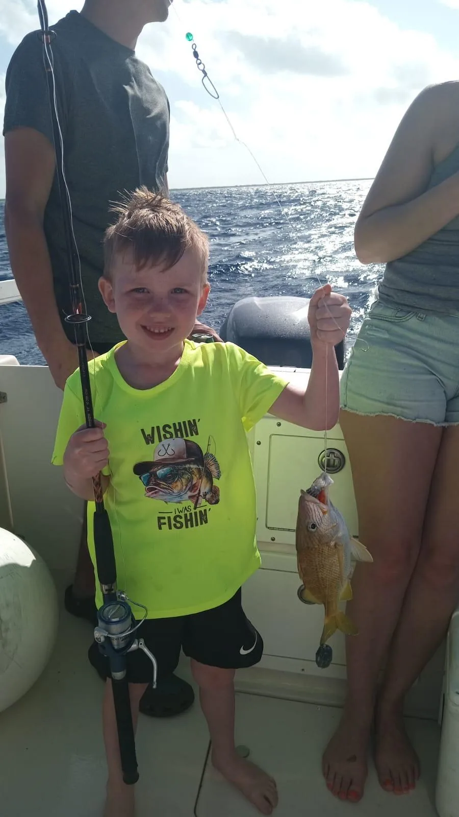 Bottom fishing at anchor with light tackle, Cozumel