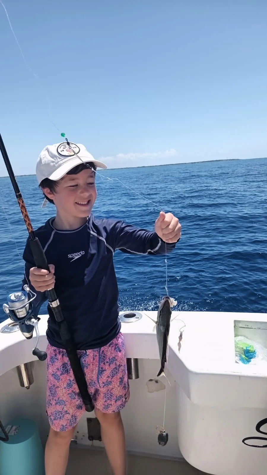 Bottom fishing at anchor with light tackle, Cozumel