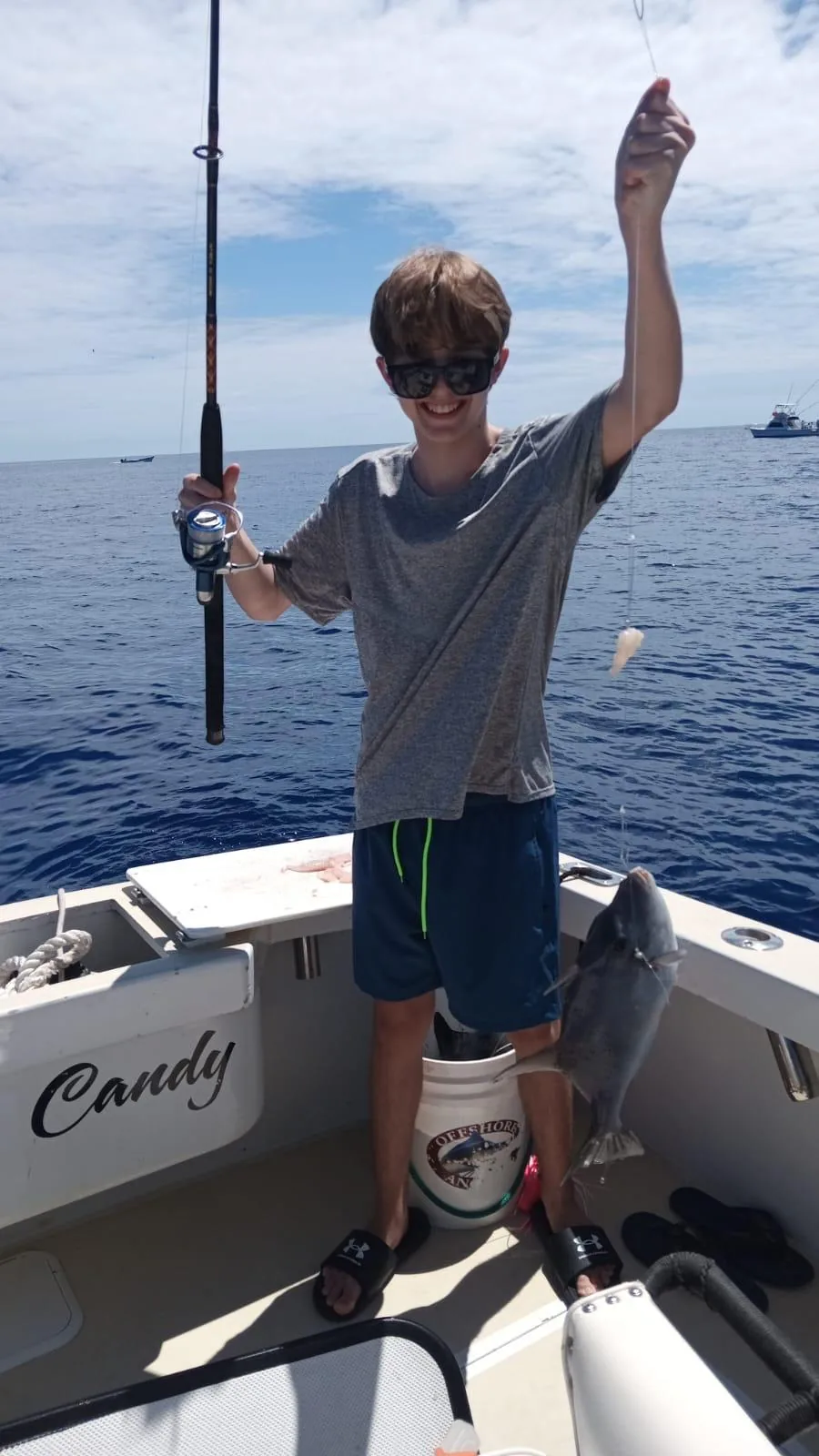 Bottom fishing at anchor with light tackle, Cozumel