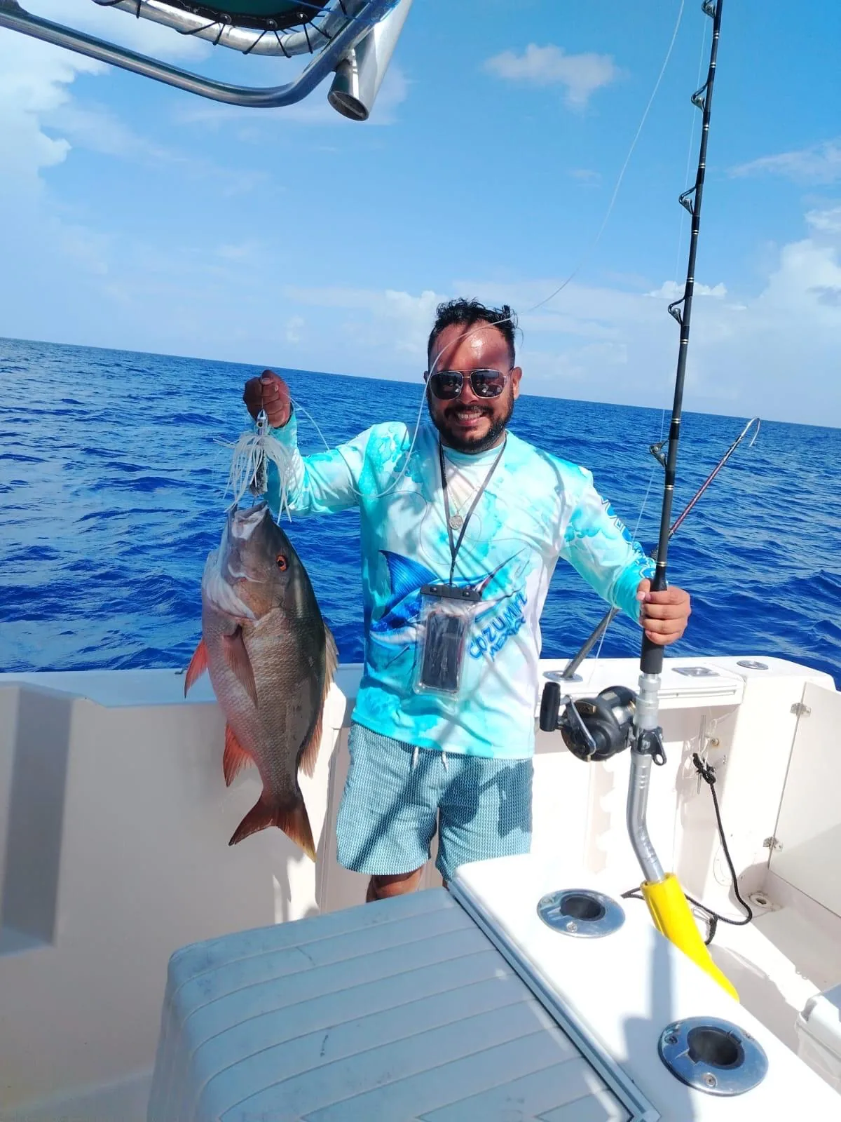 Bottom fishing at anchor with light tackle, Cozumel